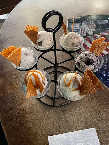 Six-scoop ice cream flight on a wire stand